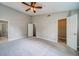 Neutral bedroom featuring ensuite bathroom and closet access at 3260 Sims View Ct, Snellville, GA 30078