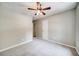 Cozy bedroom featuring neutral paint, plush carpet, and a ceiling fan with lighting at 3260 Sims View Ct, Snellville, GA 30078