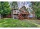 Exterior backyard view of a home, deck and stairs at 3260 Sims View Ct, Snellville, GA 30078
