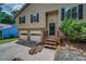 Attractive home exterior with a two car garage, driveway, and green lawn at 3260 Sims View Ct, Snellville, GA 30078