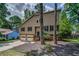 Charming home exterior with a well manicured lawn and driveway at 3260 Sims View Ct, Snellville, GA 30078