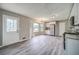 Bright open-concept kitchen with a view of the backyard and updated stainless steel appliances at 3260 Sims View Ct, Snellville, GA 30078