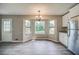 Sun-filled dining area featuring a beautiful view of the outdoor area at 3260 Sims View Ct, Snellville, GA 30078