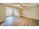 Open living room with light-colored flooring and lots of natural light at 3260 Sims View Ct, Snellville, GA 30078