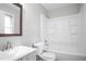 Full bathroom featuring a tub-shower combo and vanity with storage space at 34 Kelso At Peyton Dr, Atlanta, GA 30311