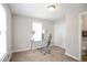 Cozy office space with a glass desk, comfortable chair, and natural light at 34 Kelso At Peyton Dr, Atlanta, GA 30311