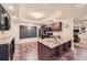 Basement kitchen with granite countertops, stainless steel appliances, and a chalkboard wall at 3270 New University Trl, Cumming, GA 30041