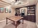 Study room including a built-in bookcase, carpet and office chair at 3270 New University Trl, Cumming, GA 30041