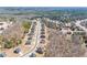 Panoramic aerial view showcasing the layout of houses and streets in a residential community at 3316 Quarter Horse Ln, Conyers, GA 30013