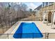 A beautiful backyard showcases a sparkling in-ground pool and wrought iron fence, perfect for hot summer days at 3316 Quarter Horse Ln, Conyers, GA 30013