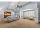 Carpeted basement featuring a living area with a sofa, armchairs, and a wet bar at 4080 Glen Hill Ne Way, Marietta, GA 30066