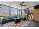 Comfortable screened porch with a fire pit, mounted television and ceiling fan at 4080 Glen Hill Ne Way, Marietta, GA 30066