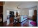 Bright living room with hardwood floors, a ceiling fan and lots of windows at 93 Richmond Way, Villa Rica, GA 30180