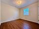 Cozy bedroom with wood-look floors and natural light at 248 Arnold Ave, Marietta, GA 30066