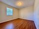 Bedroom with wood-look floors and natural light at 248 Arnold Ave, Marietta, GA 30066