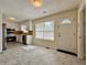 Bright, eat-in kitchen featuring a door to the outside and stainless steel appliances at 248 Arnold Ave, Marietta, GA 30066