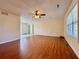 Bright open living space with wood laminate floors flowing into an adjacent kitchen at 248 Arnold Ave, Marietta, GA 30066