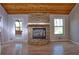 Inviting living room with a stone fireplace, vaulted ceilings, and hardwood floors at 3572 Dexter Way, Marietta, GA 30062