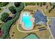 Aerial view of community pool, clubhouse, and playground at 68 Hardy Water Dr, Lawrenceville, GA 30045