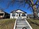 Charming renovated home featuring a freshly painted exterior and inviting front steps at 1510 Olympian Sw Way, Atlanta, GA 30310