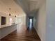 Open concept floorplan with hardwood floors and neutral paint throughout the home at 1510 Olympian Sw Way, Atlanta, GA 30310