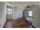 A beautifully renovated bedroom with hardwood flooring and a ceiling fan at 1510 Olympian Sw Way, Atlanta, GA 30310