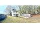 Spacious backyard with a patio seating area and a gazebo for outdoor relaxation at 3897 Vine Stone Dr, Stonecrest, GA 30038