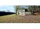 Spacious backyard featuring a gazebo with ample room for outdoor activities at 3897 Vine Stone Dr, Stonecrest, GA 30038