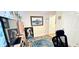 Cozy bedroom features walls adorned with artwork, complemented by a stylish rug and comfortable furnishings at 3897 Vine Stone Dr, Stonecrest, GA 30038