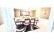 The dining room displays a large table set with decorative accents and crown molding at 3897 Vine Stone Dr, Stonecrest, GA 30038