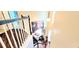 View of two-story foyer from stairs featuring art and a view to a bright living space at 3897 Vine Stone Dr, Stonecrest, GA 30038