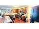 Well-lit kitchen with wood cabinets, stainless appliances and open layout at 3897 Vine Stone Dr, Stonecrest, GA 30038
