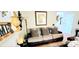 Comfortable living room area showcasing a cozy sofa and stylish home decor at 3897 Vine Stone Dr, Stonecrest, GA 30038