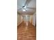 Spacious bedroom features wood floors and fan for a cozy and inviting atmosphere at 4473 Marjorie, Snellville, GA 30039