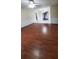 Open floor plan features hardwood floors and a ceiling fan, perfect for entertaining and relaxation at 4473 Marjorie, Snellville, GA 30039