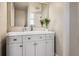Bathroom vanity featuring gray cabinets, white countertop, modern faucet and large mirror at 502 Pryor Sw St # 301, Atlanta, GA 30312
