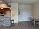 Open dining space featuring kitchen area, storage, and hard wood flooring at 502 Pryor Sw St # 301, Atlanta, GA 30312