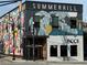 Exterior shot of a building showcasing colorful murals and the 'BOCA' sign at 502 Pryor Sw St # 301, Atlanta, GA 30312