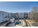 Apartment complex with a pool, green space, walkways, and mature trees on a sunny day at 502 Pryor Sw St # 301, Atlanta, GA 30312