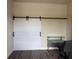 Home office featuring a desk with an office chair and barn doors at 502 Pryor Sw St # 301, Atlanta, GA 30312