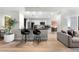 Modern kitchen with white cabinetry, stainless steel appliances, and a breakfast bar for seating at 2870 Pharr Ct # 3002, Atlanta, GA 30305