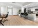 Bright open living space with kitchen island and breakfast bar at 2870 Pharr Ct # 3002, Atlanta, GA 30305