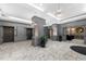 Grand lobby area with elevators, elegant columns, and decorative lighting fixtures at 2870 Pharr Ct # 3002, Atlanta, GA 30305