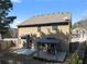 Fenced backyard with a gazebo and patio offers a perfect outdoor living space at 6545 Muirfield Pt, Fairburn, GA 30213