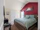 Cozy bedroom featuring a modern bed frame, plush bedding, and ample natural light at 6545 Muirfield Pt, Fairburn, GA 30213