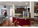 Spacious kitchen featuring granite countertops, stainless appliances, and an open layout to the living spaces at 6545 Muirfield Pt, Fairburn, GA 30213