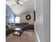 Inviting living room with vaulted ceiling, ceiling fan, and a comfortable sofa at 6545 Muirfield Pt, Fairburn, GA 30213