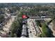 Neighborhood with tree lined streets showing layout of community and homes from above at 145 Sunset Ln, Woodstock, GA 30189