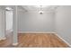 Dining room featuring hardwood floors and a chandelier at 145 Sunset Ln, Woodstock, GA 30189