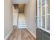 Spacious foyer with hardwood floors, a staircase, and ample natural light at 145 Sunset Ln, Woodstock, GA 30189